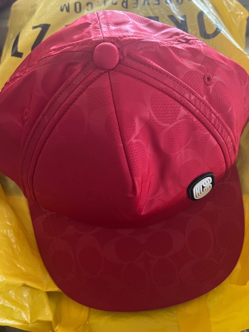 Coach Red Hat